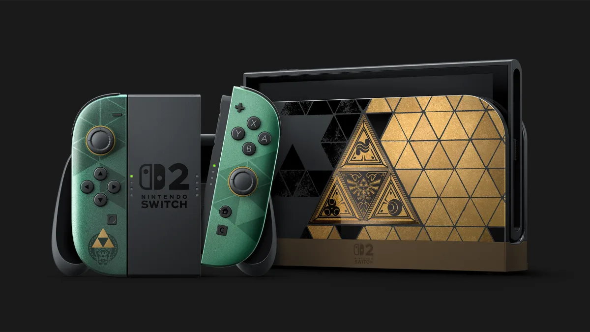 Nintendo Switch 2 del 40.º aniversario de The Legend of Zelda: mandos Joy-Con 2 verdes con la Trifuerza y base negra y dorada con triángulos y una gran Trifuerza.